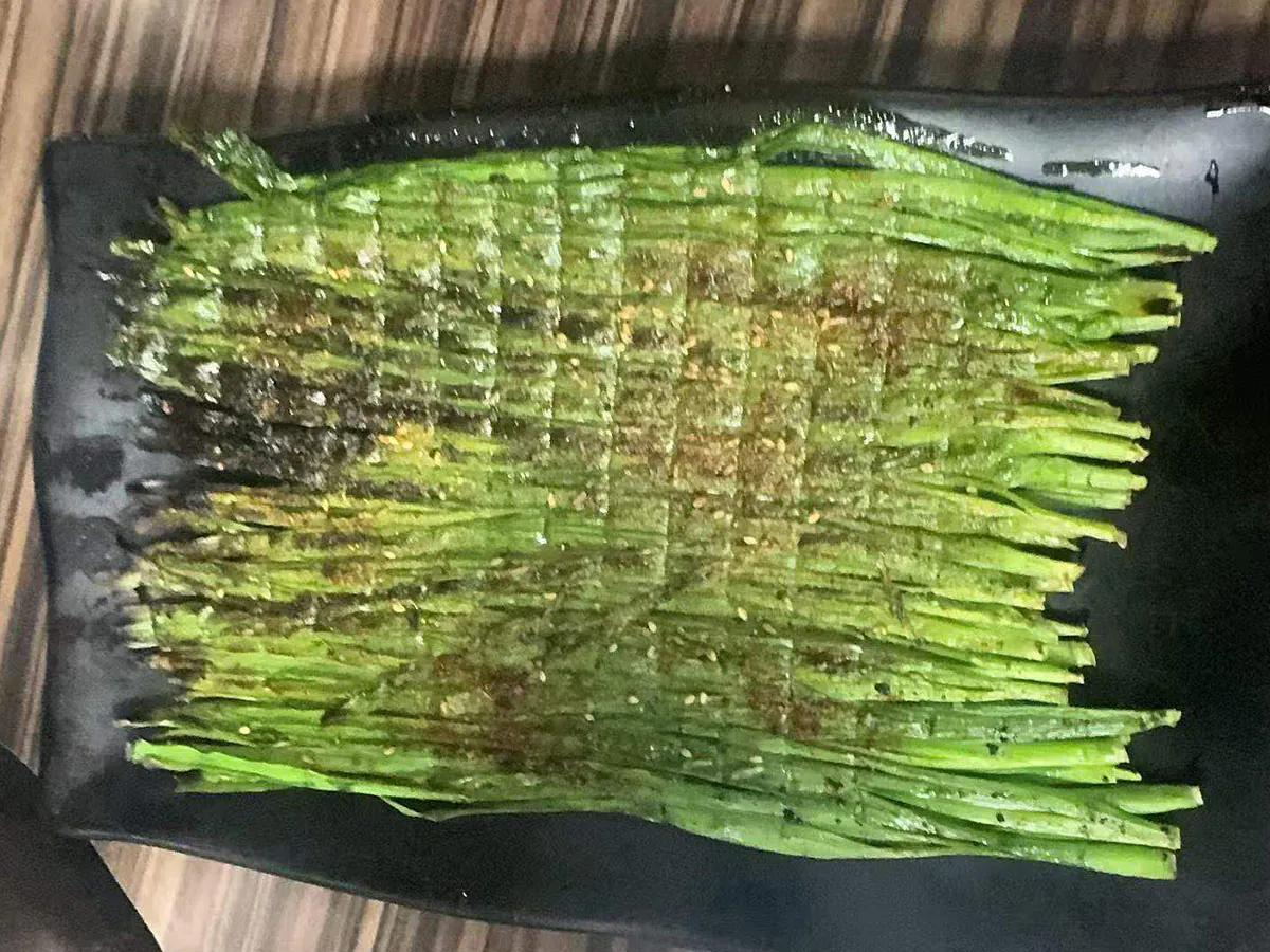 Sesame-spiced grilled chives at Xin Jiang BBQ, a Chinese Restaurant in Houston