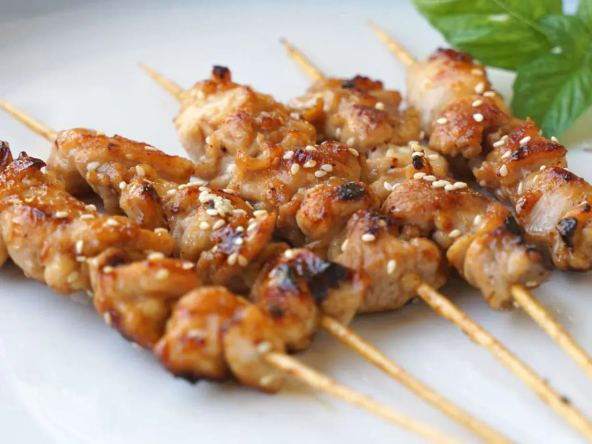 Sesame-topped grilled chicken skewers at Xin Jiang BBQ, a Chinese Restaurant in Houston